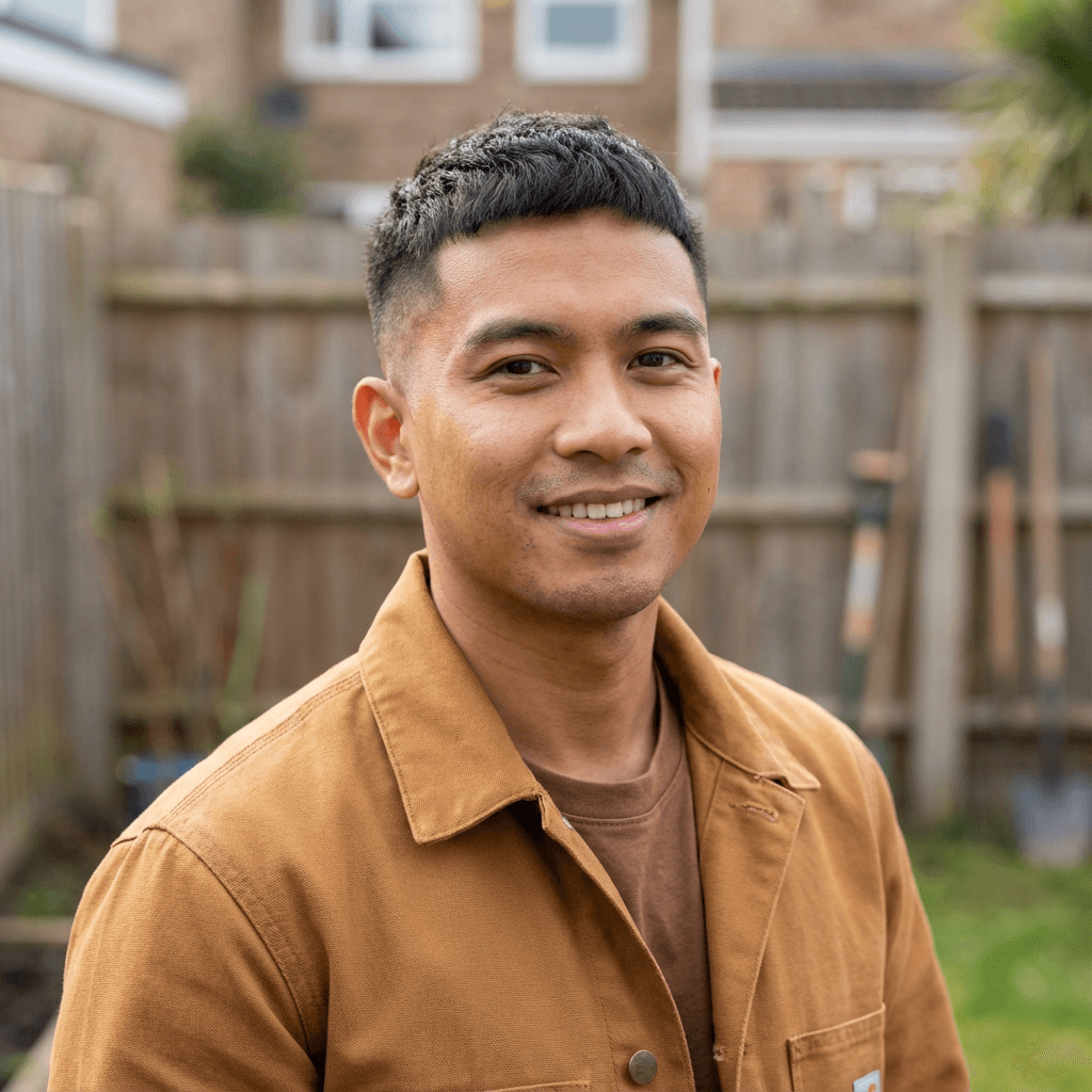 Friendly male technician in a bright living room